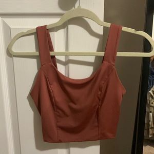 Cropped workout tank top. Medium but could fit a small too